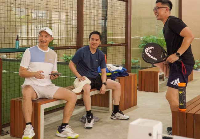 Padel players on court